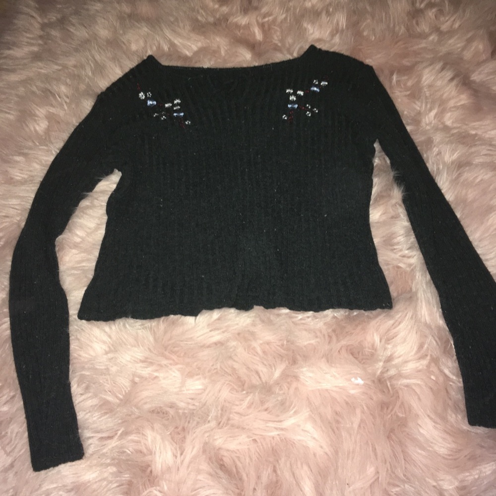 Gray long sleeve with flowers.